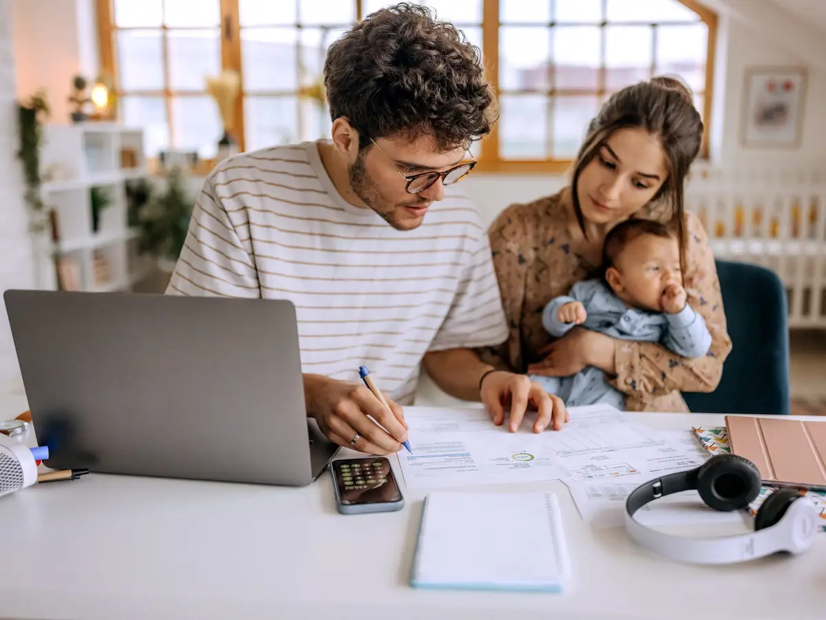 Person mindfully planning finances in peaceful environment