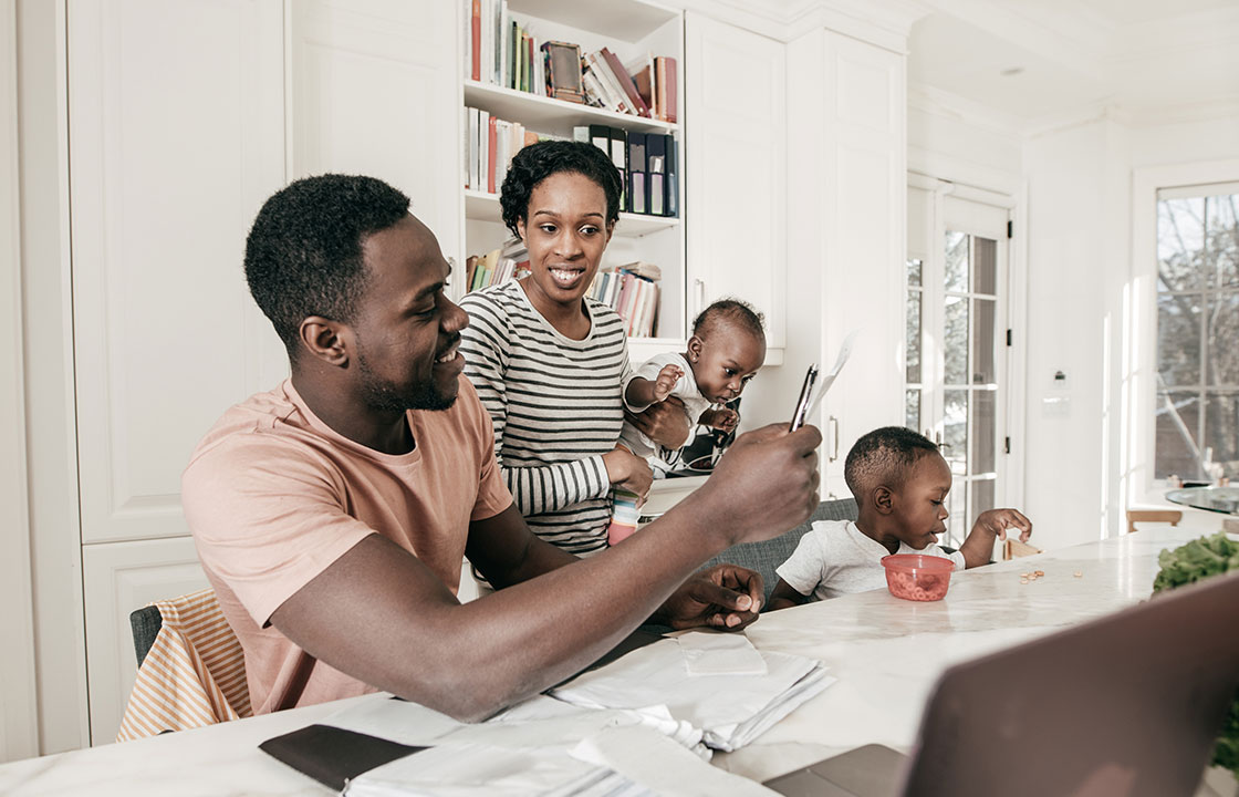 Diverse Canadian families learning about finances together